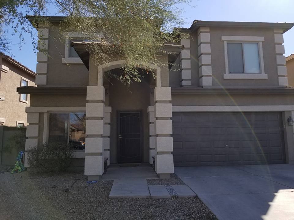 Completed exterior repaint backed by Sun Palms Painting’s workmanship guarantee with affordable house painting