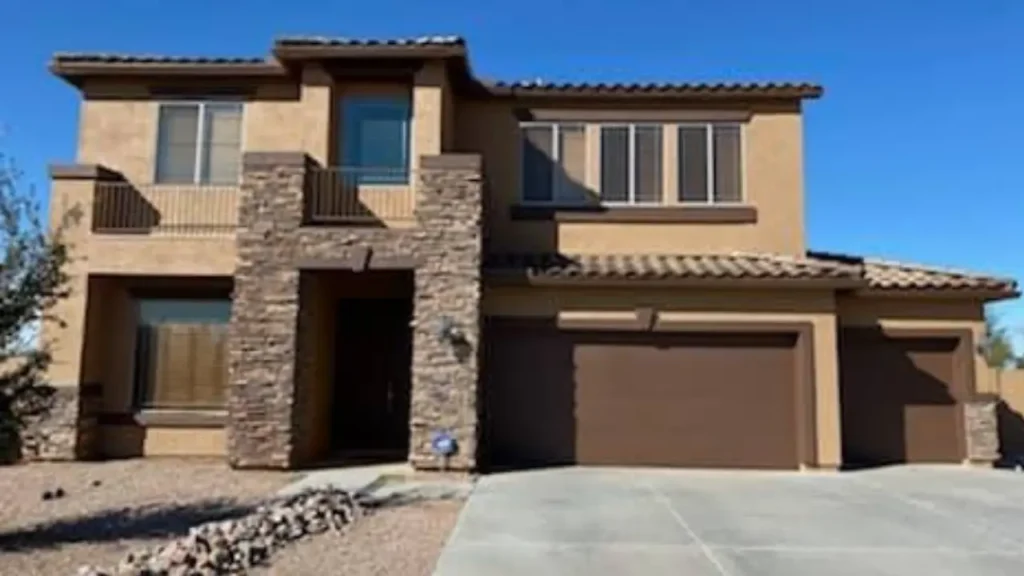 Front view of home after full exterior repaint by Sun Palms Painting.