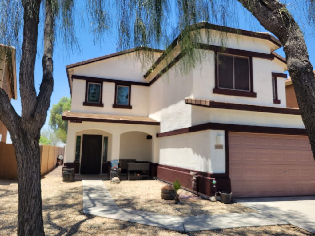 Painted stucco home in Arizona with long-lasting exterior affordable house painting.